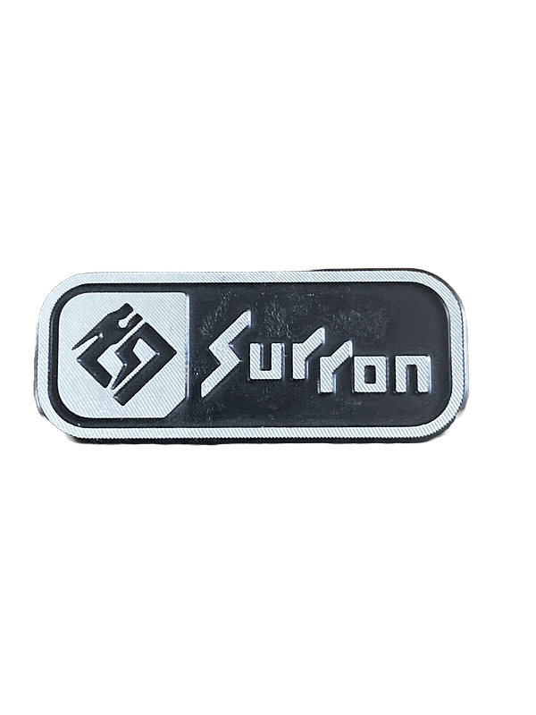 surron battery cover badge